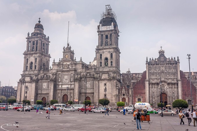 Mexico City Metropolitan Cathedral: The grand façade of the Mexico City Metropolitan Cathedral, located in the Zócalo, one of the largest public squares in the world. This iconic structure stands as a testament to centuries of Mexican history.