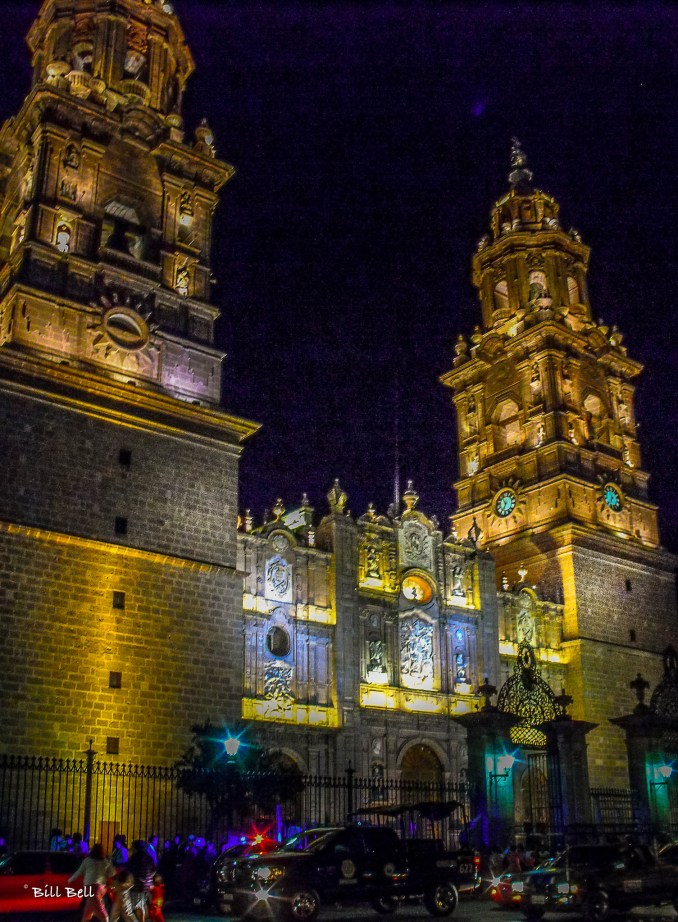 The Morelia Cathedral illuminated at night, a magnificent example of baroque architecture that dominates the city’s skyline, especially stunning after dark.