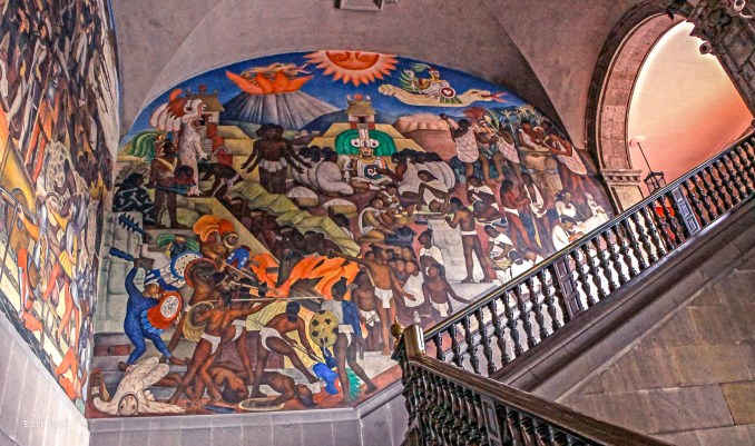 Diego Rivera's Mural: A vibrant Diego Rivera mural inside the National Palace in Mexico City, depicting Mexico's rich and tumultuous history. The mural beautifully captures the blend of pre-Columbian and colonial influences.