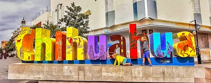 The playful and colorful "Chihuahua" sign in the city center invites visitors to explore and take memorable photos, capturing the essence of this lively Mexican city.