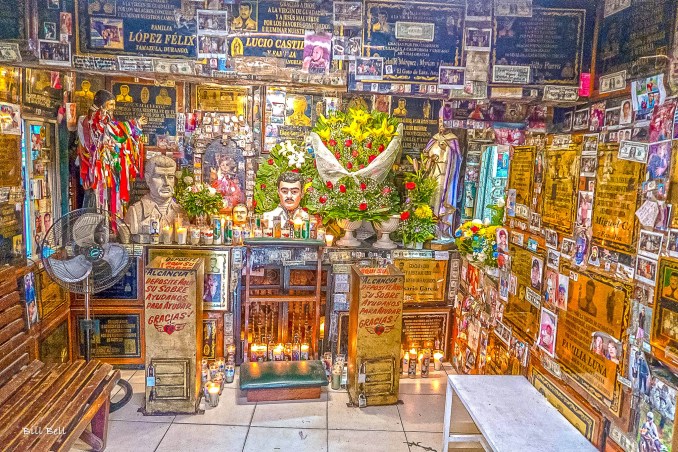 The walls of the Jesús Malverde Shrine in Culiacán are adorned with colorful portraits, offerings, and plaques from devotees. Each item tells a story of hope, faith, and gratitude, reflecting the deep reverence for this legendary figure.