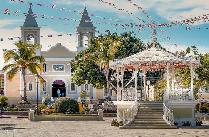 The historic Mission San Jose del Cabo Añuití, framed by lush greenery, stands as a tranquil symbol of faith and tradition in the heart of San Jose del Cabo. Founded in 1730, this charming mission draws visitors with its colonial architecture and serene ambiance, offering a glimpse into the town's rich history on the Baja Peninsula.